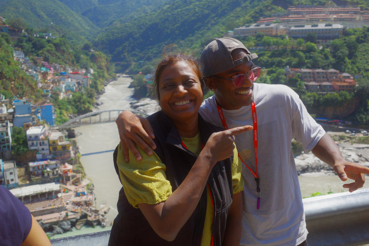 Arun and his mum Hema smiling together